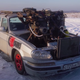 Image for article titled Man Connects Three Engines With Belts To Create A 12-Cylinder Monster